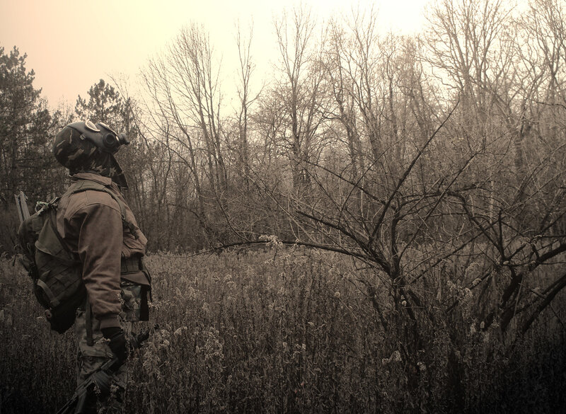 soldier in wooded area