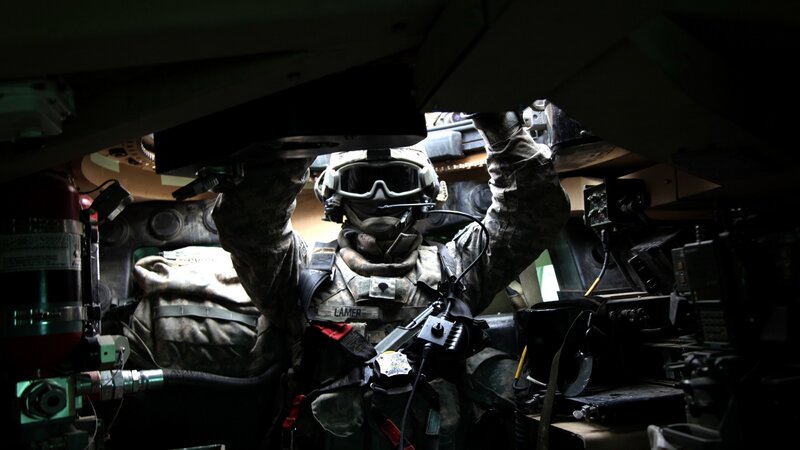 Soldier inside armored vehicle