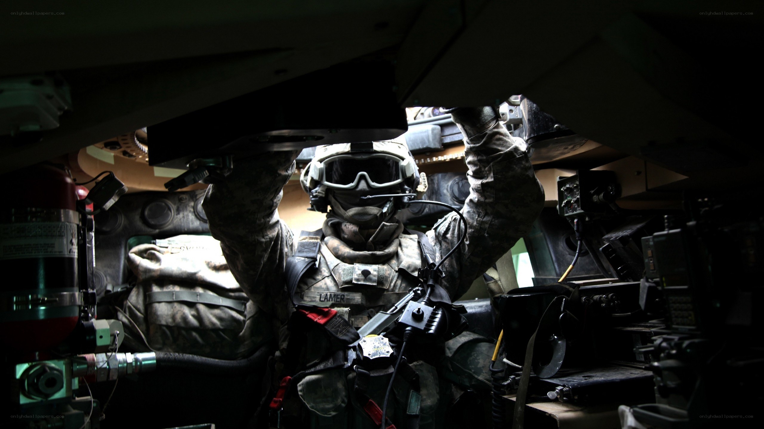Soldier inside armored vehicle