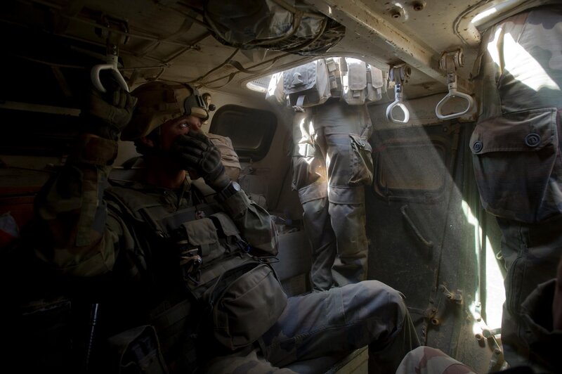 Soldier inside armored vehicle