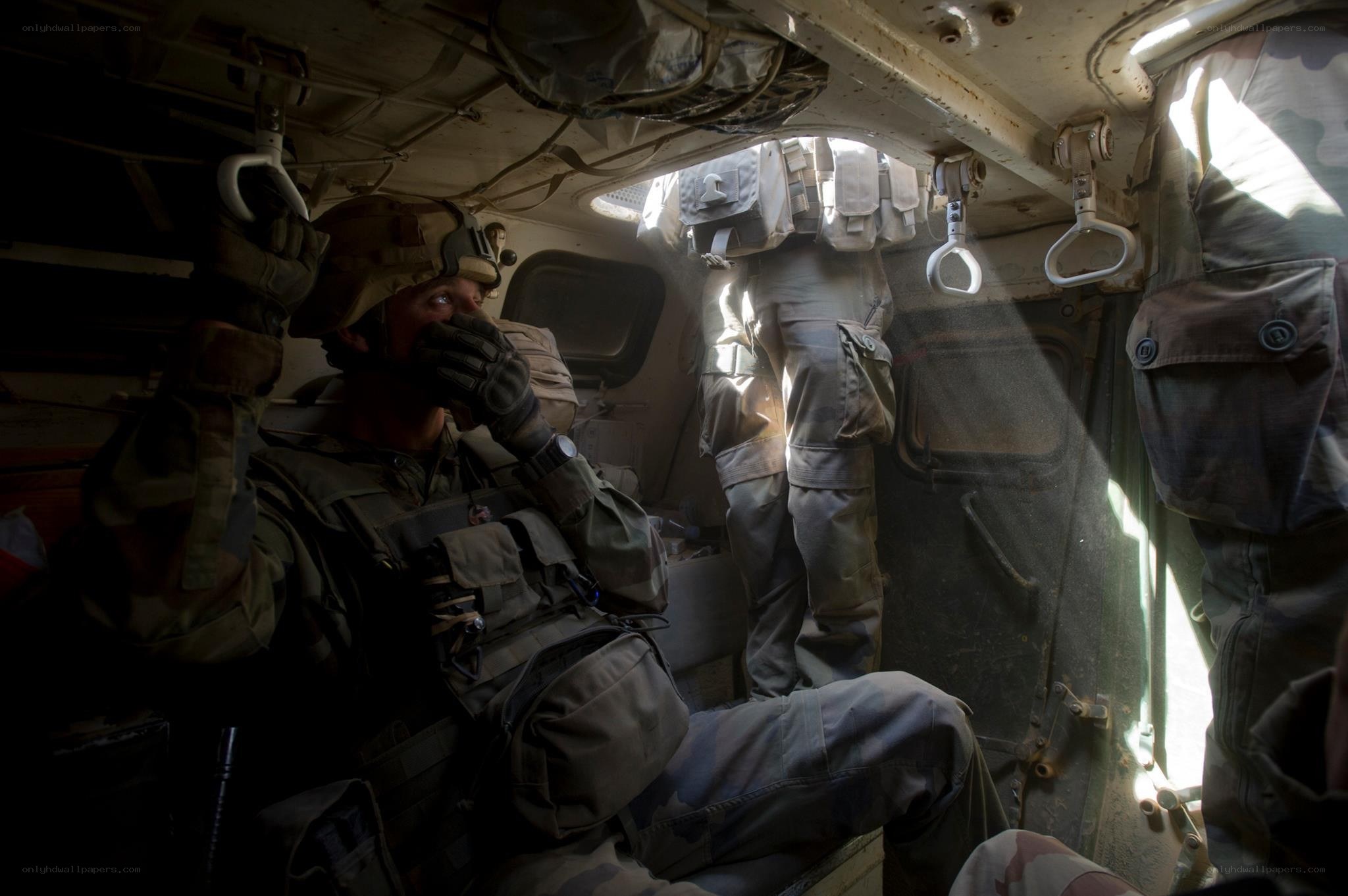 Soldier inside armored vehicle