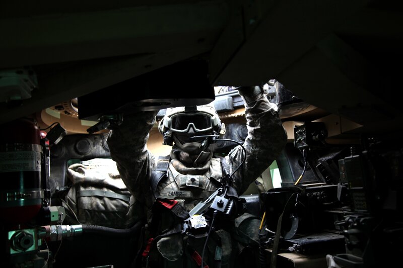 Soldier inside armored vehicle
