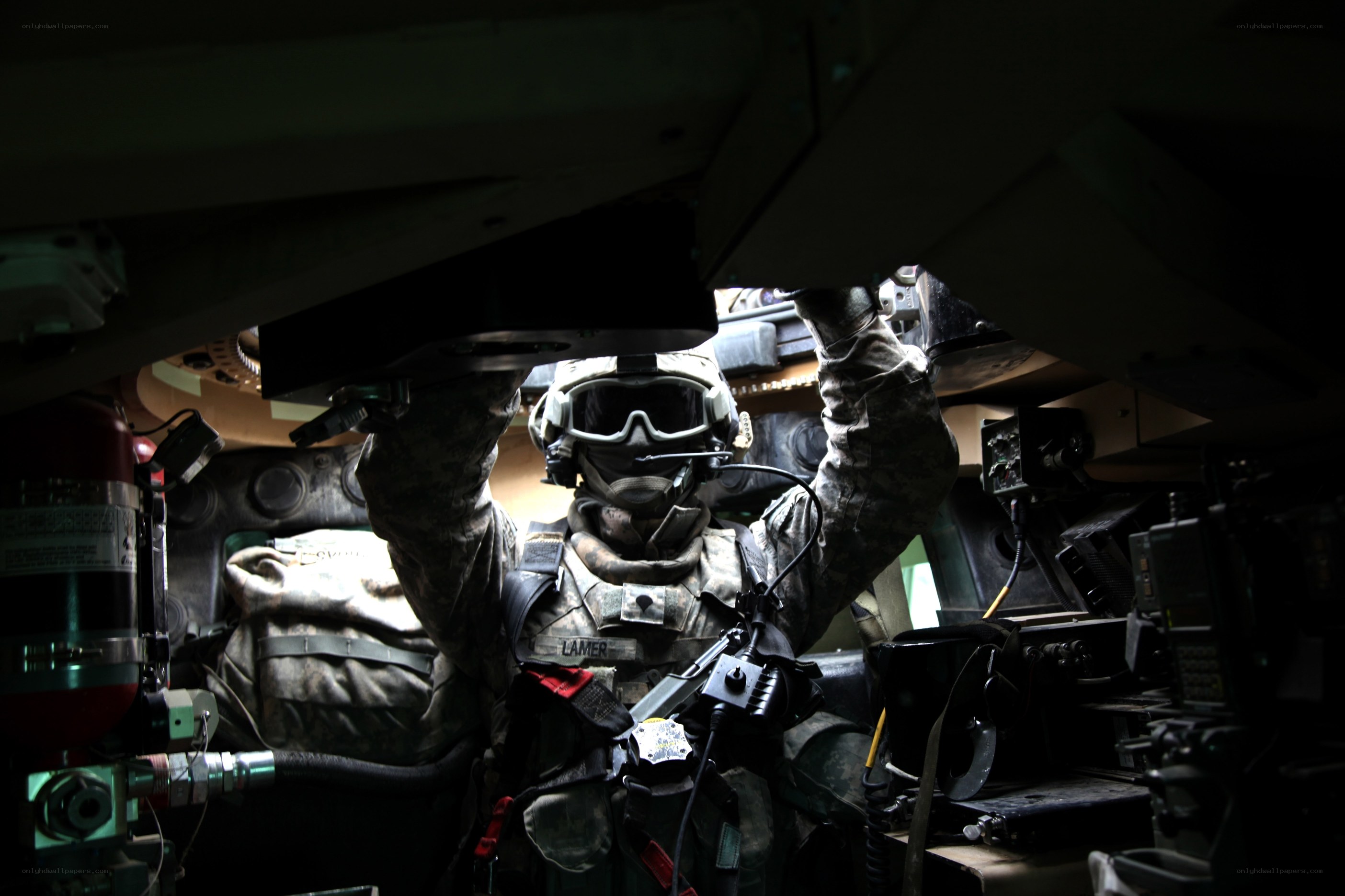 Soldier inside armored vehicle