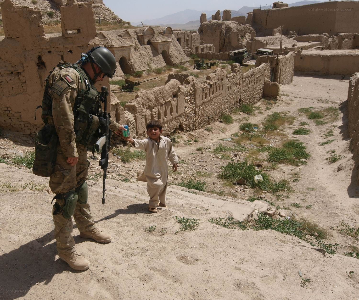 Soldier interacting with a child
