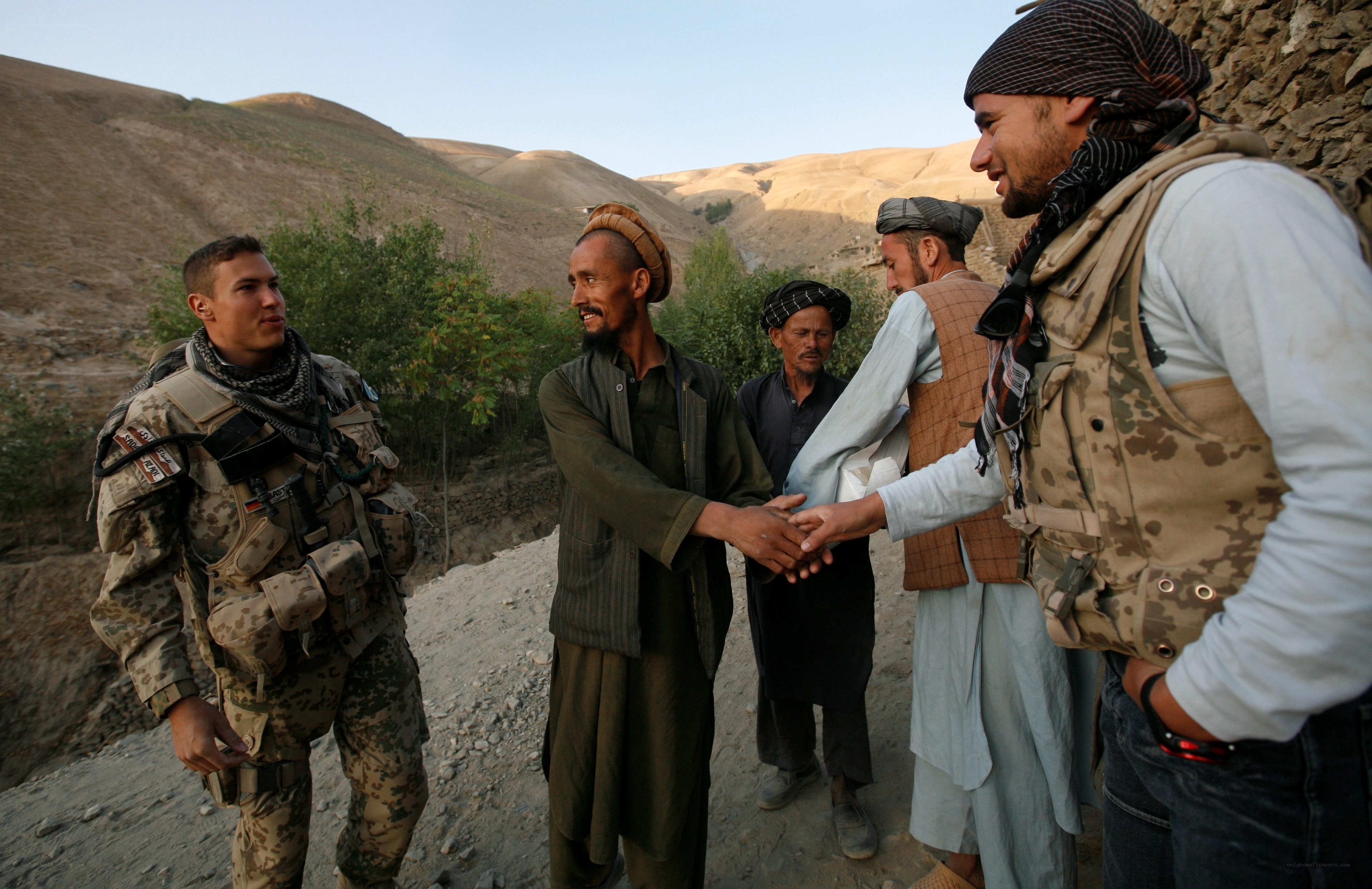 Soldier interacting with locals