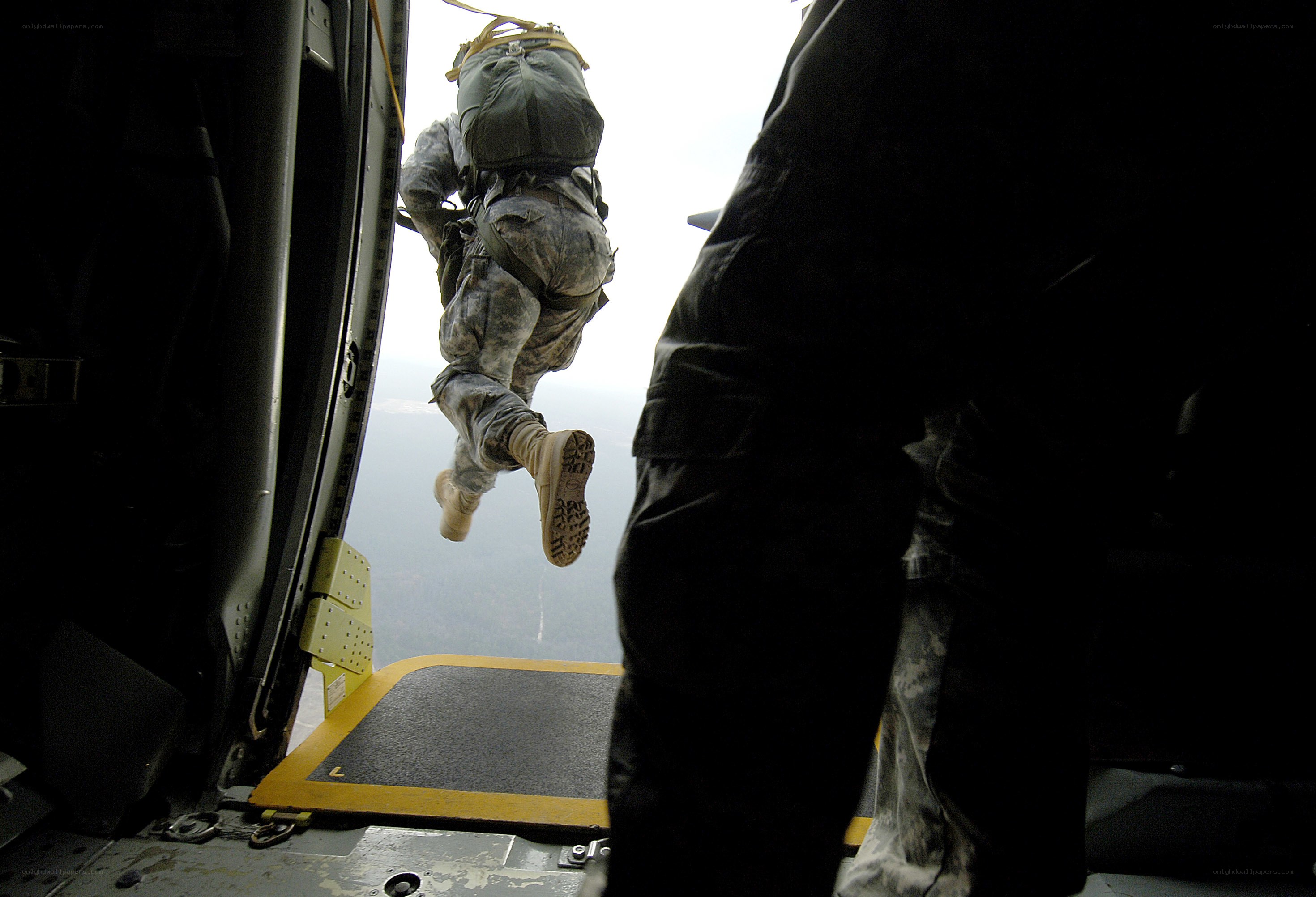 Soldier jumping from helicopter