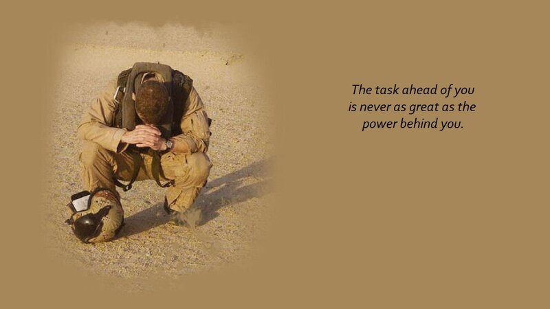 Soldier Kneeling in Desert
