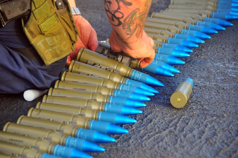 Soldier loading ammunition