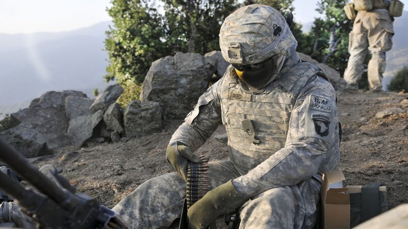 Soldier Loading Ammunition — Camouflage