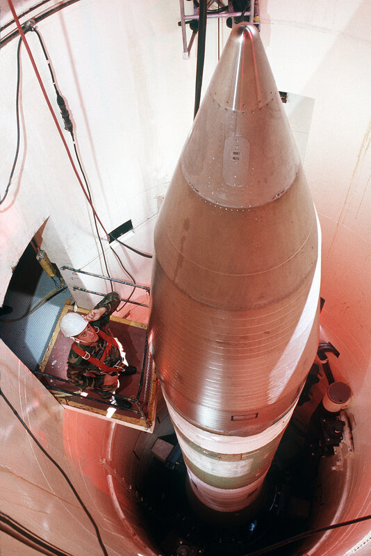 Soldier near missile in silo