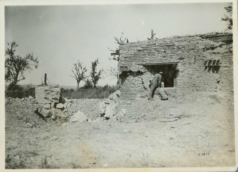 Soldier near ruined building