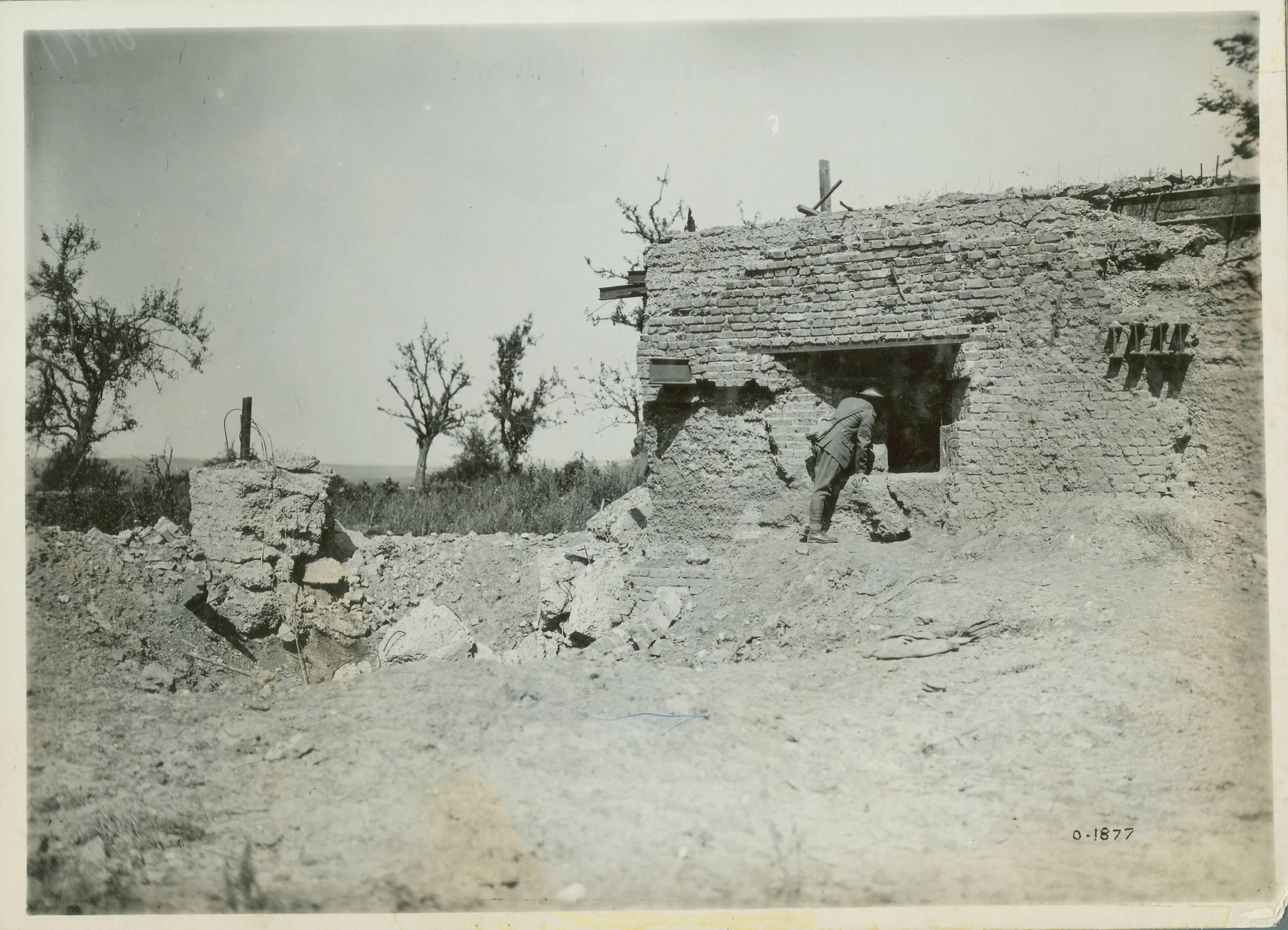 Soldier near ruined building