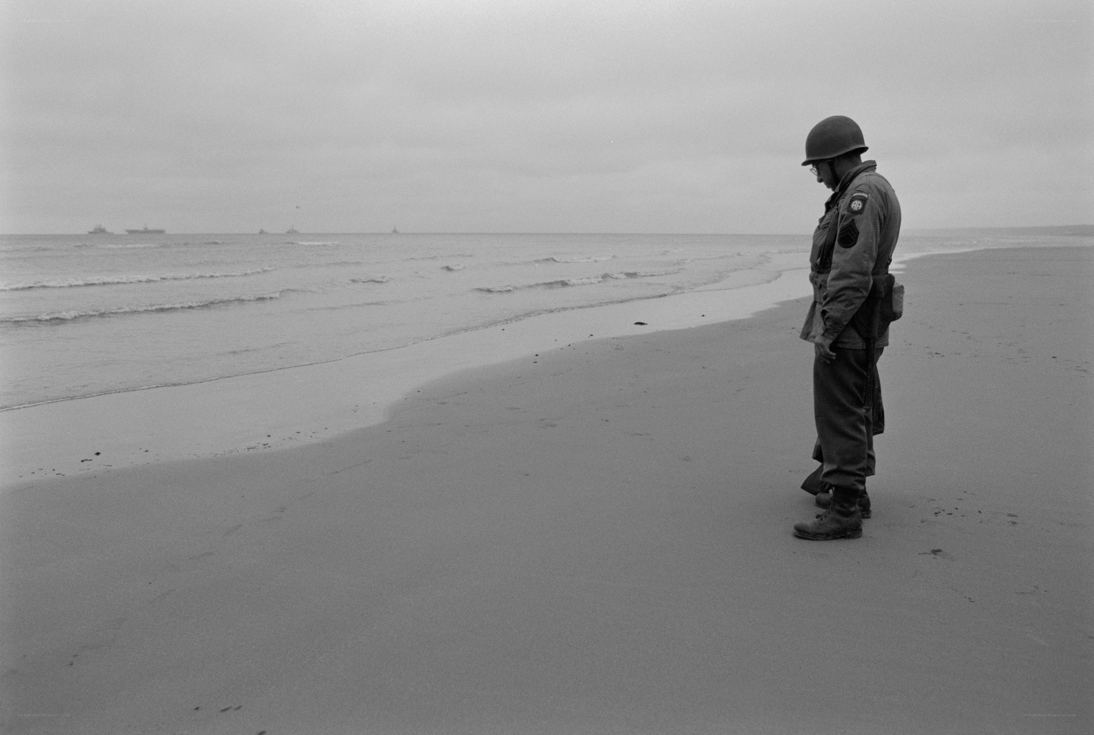 Soldier on a beach at dawn