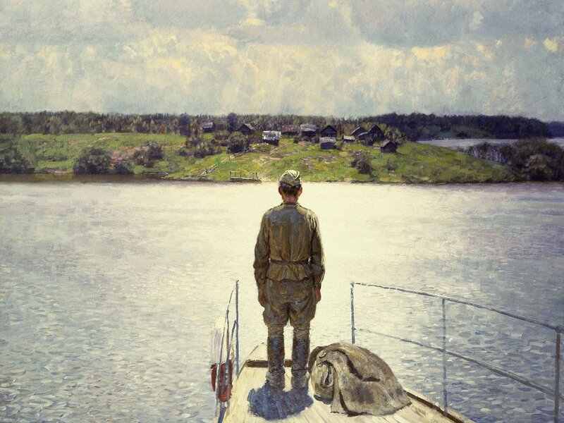 Soldier on a boat looking at village
