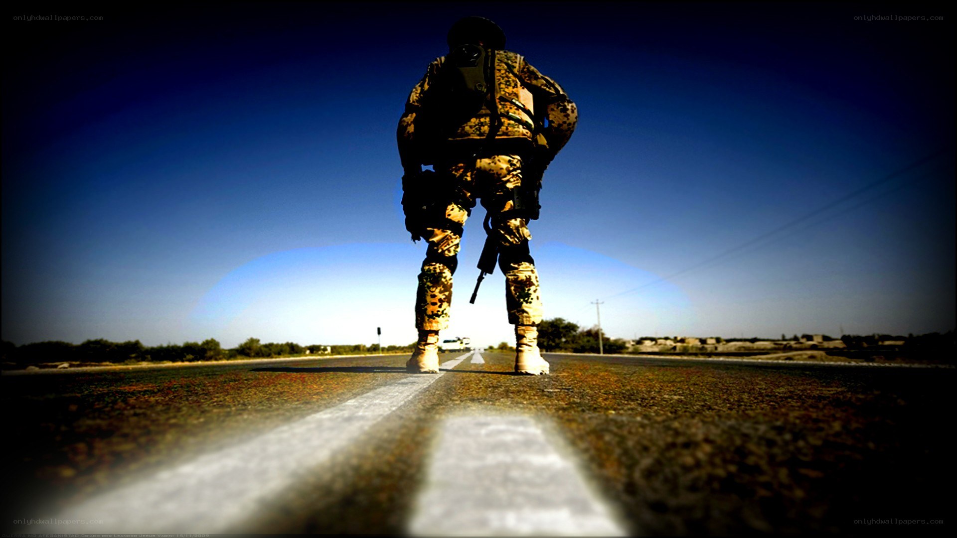 Soldier on a desert road