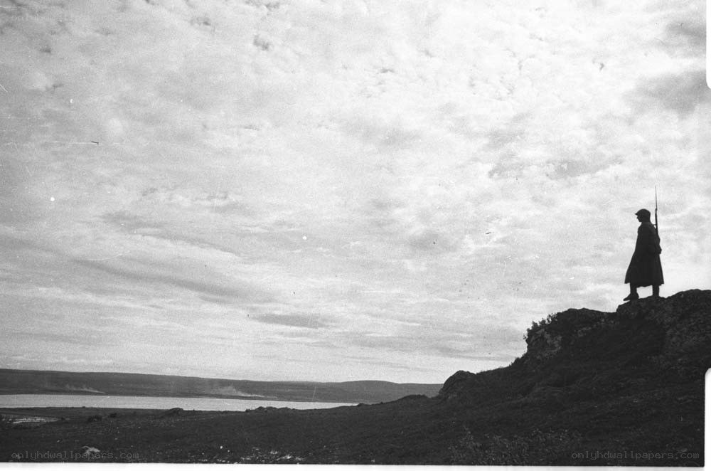 Soldier on a hilltop