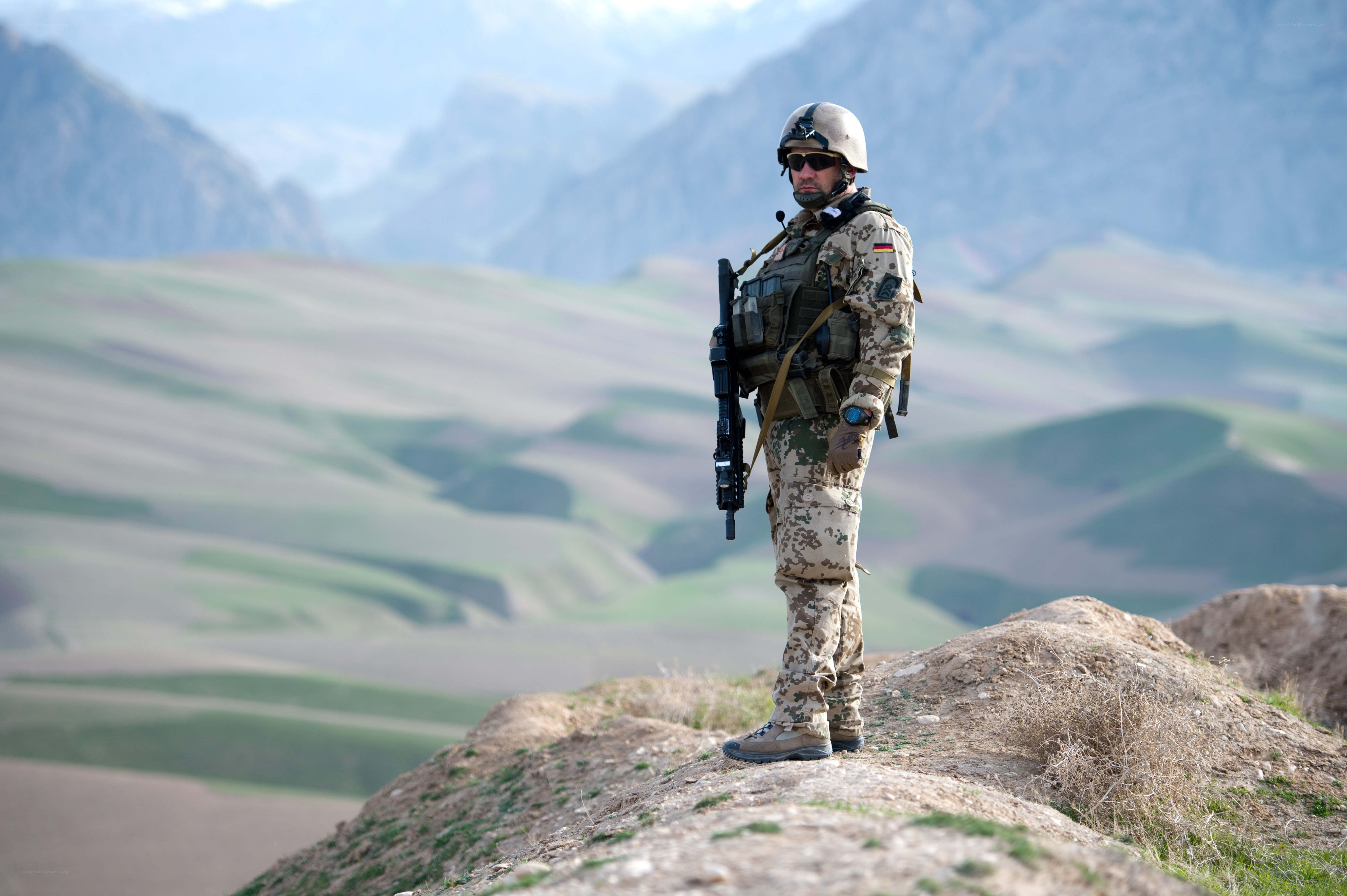 Soldier on a mountain ridge
