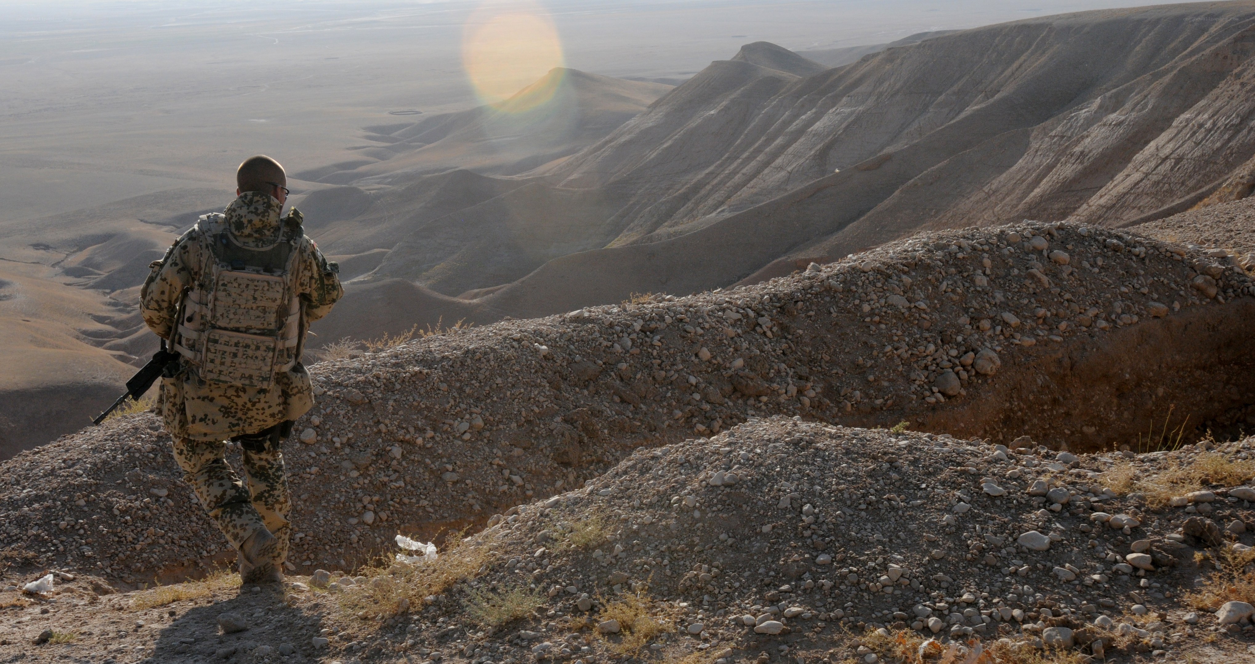 Soldier on a mountain ridge