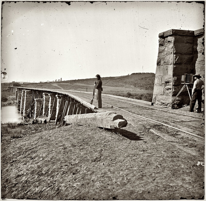 Soldier on a railway bridge