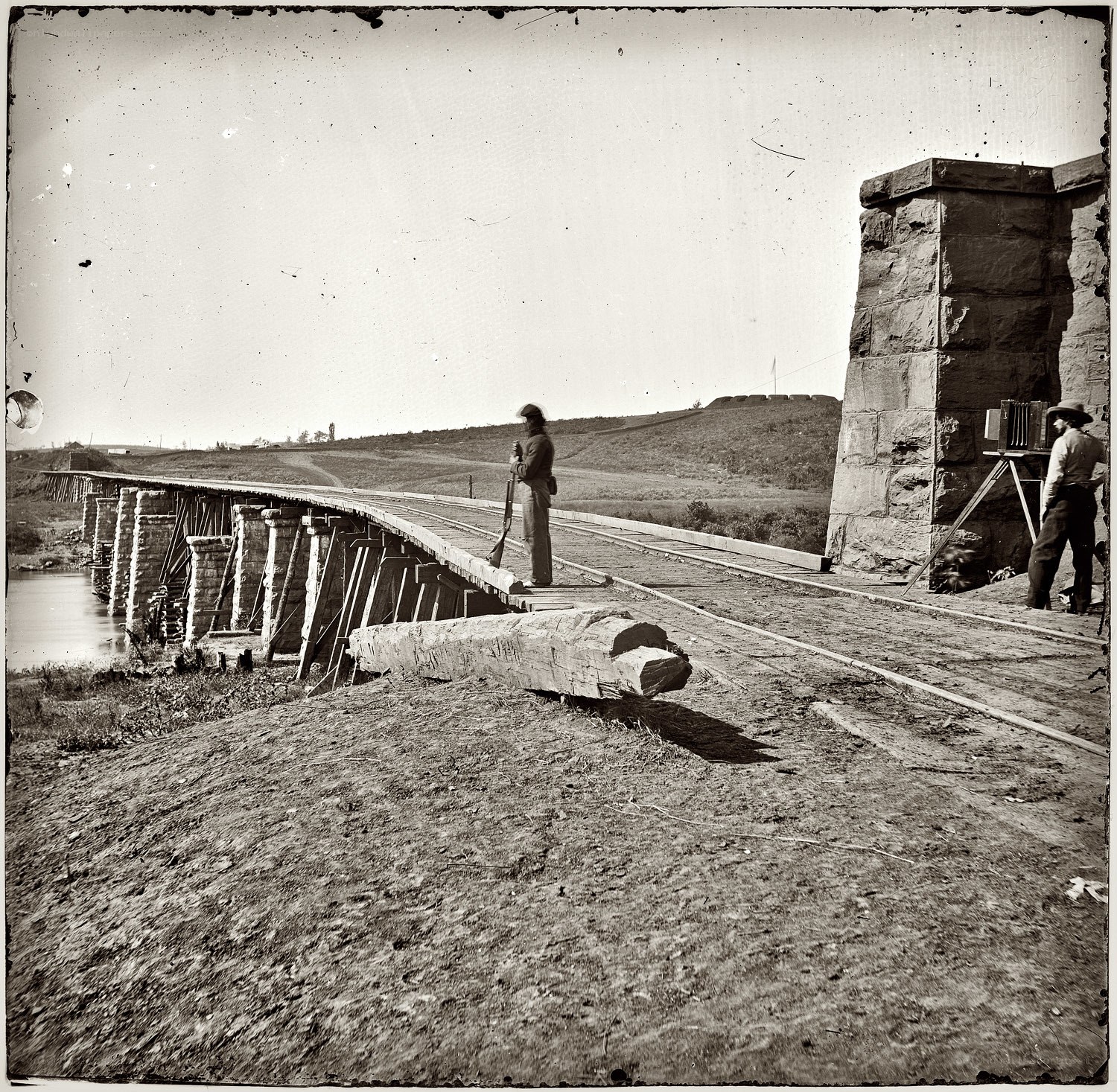 Soldier on a railway bridge