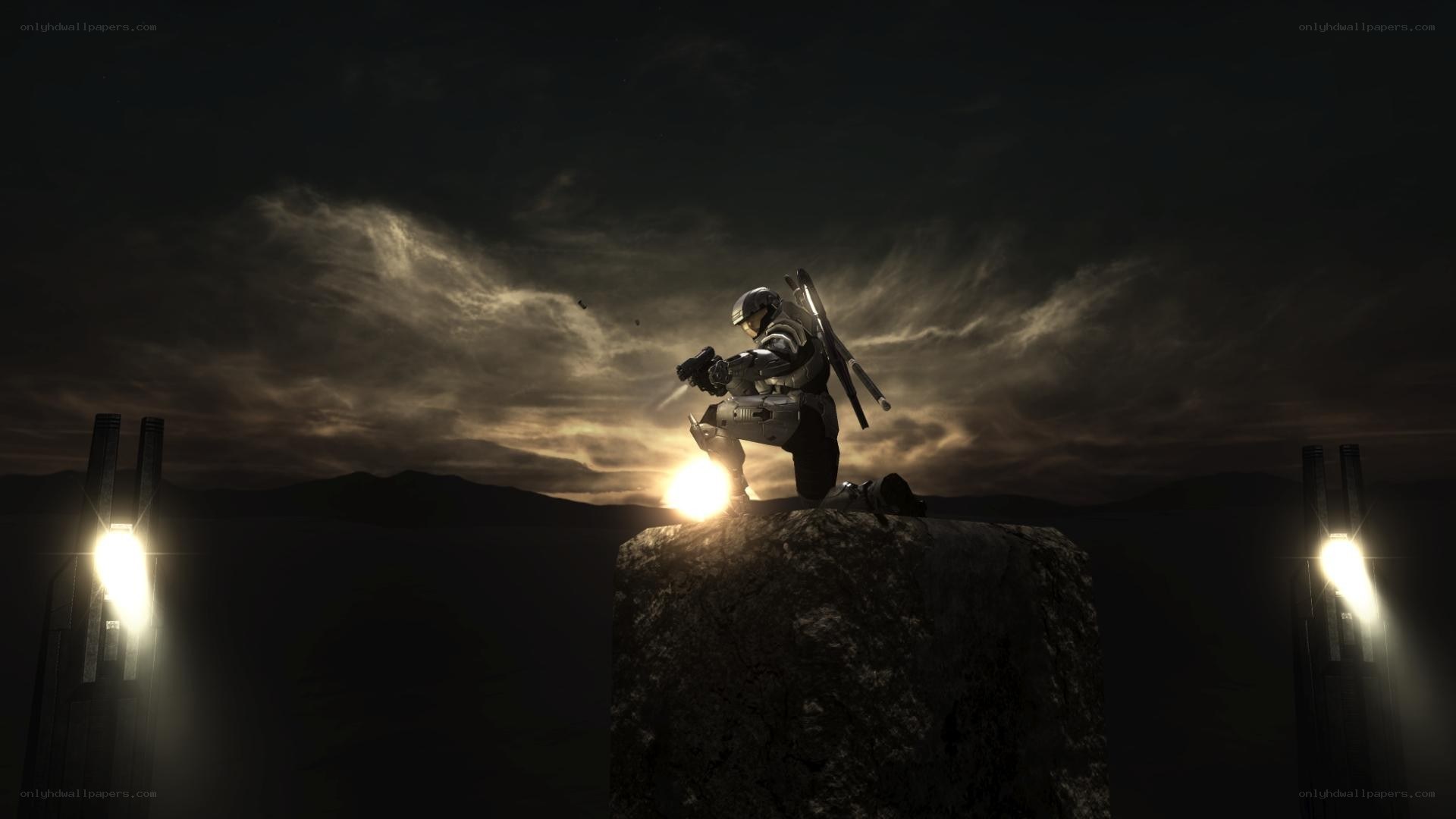 soldier on a rock at sunset