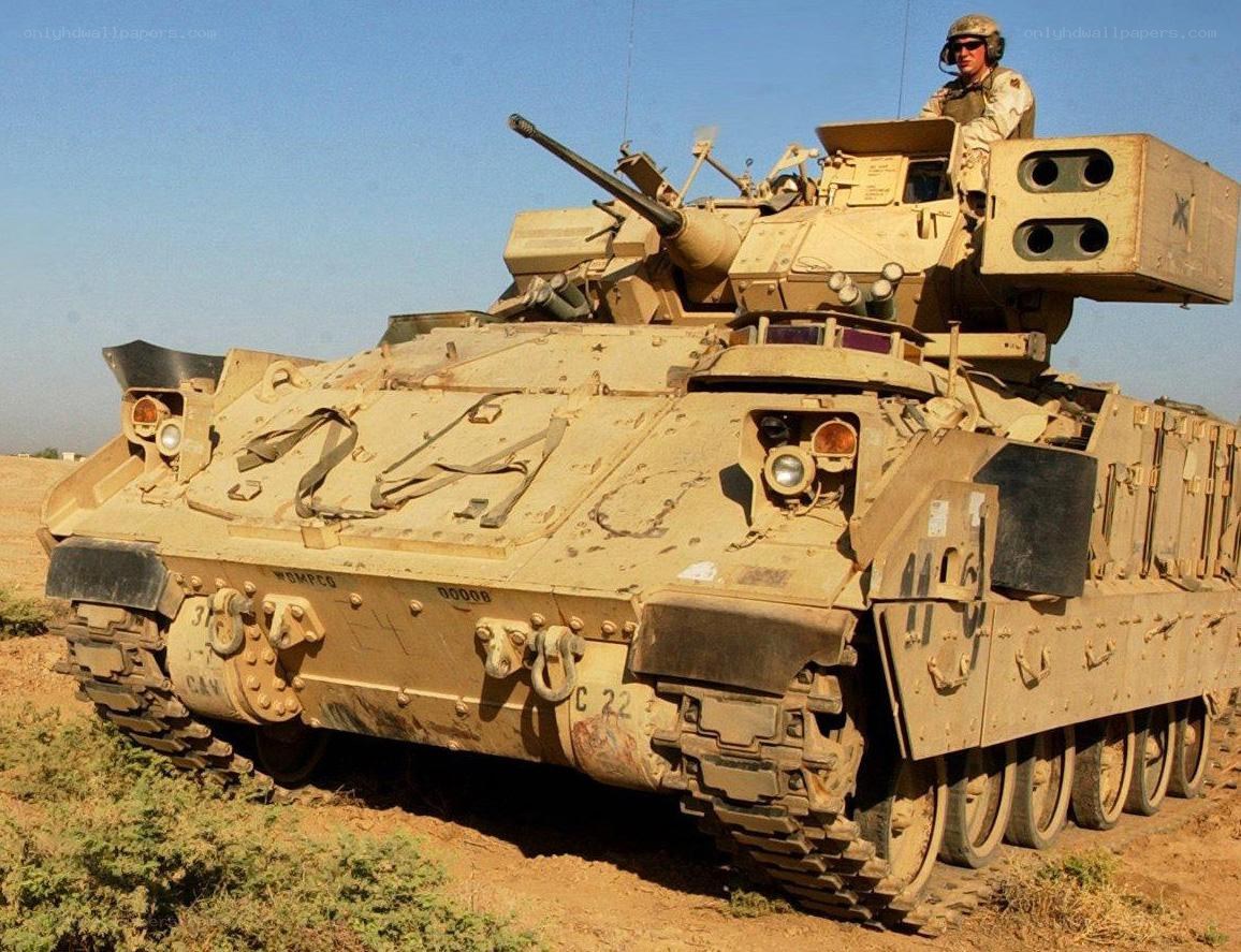 Soldier on armored vehicle