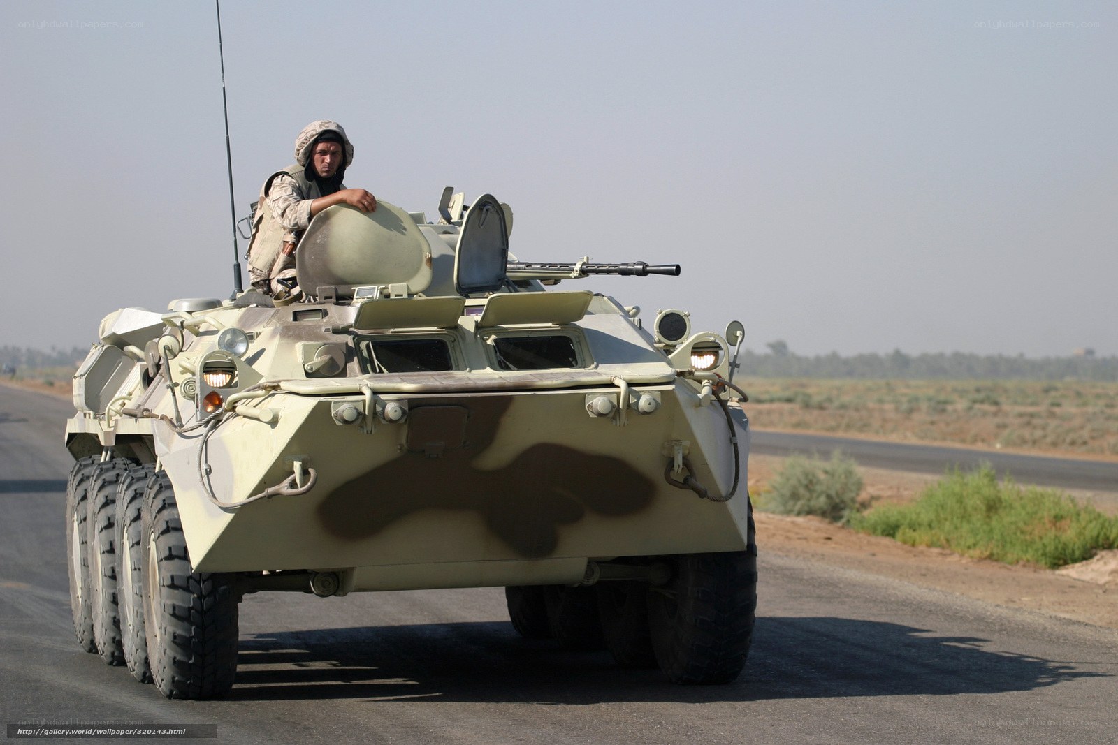 Soldier on armored vehicle