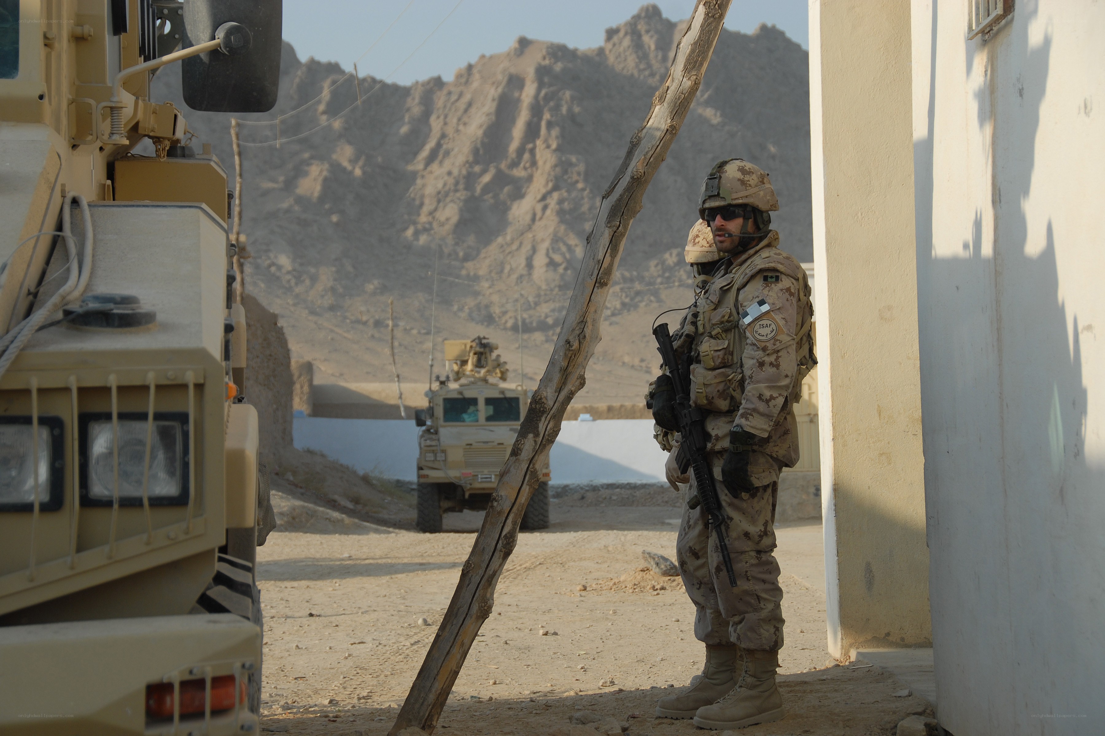 Soldier on guard in desert