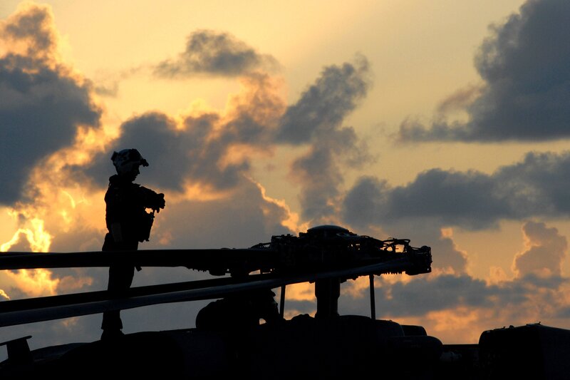 Soldier on Helicopter — Orange