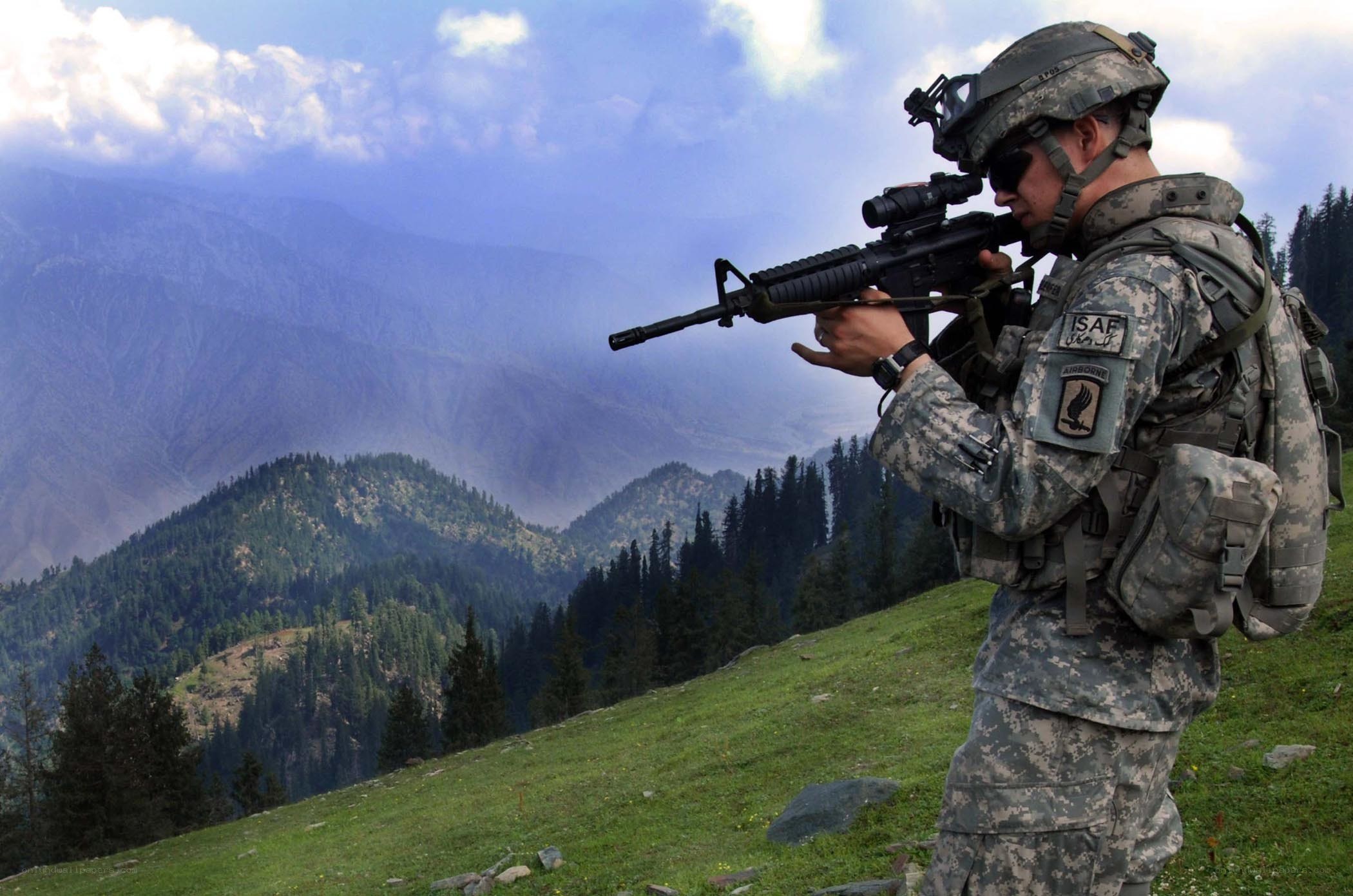 Soldier on mountain overlook