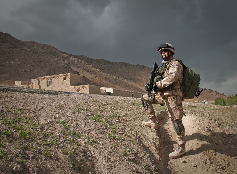Soldier on patrol in mountainous region