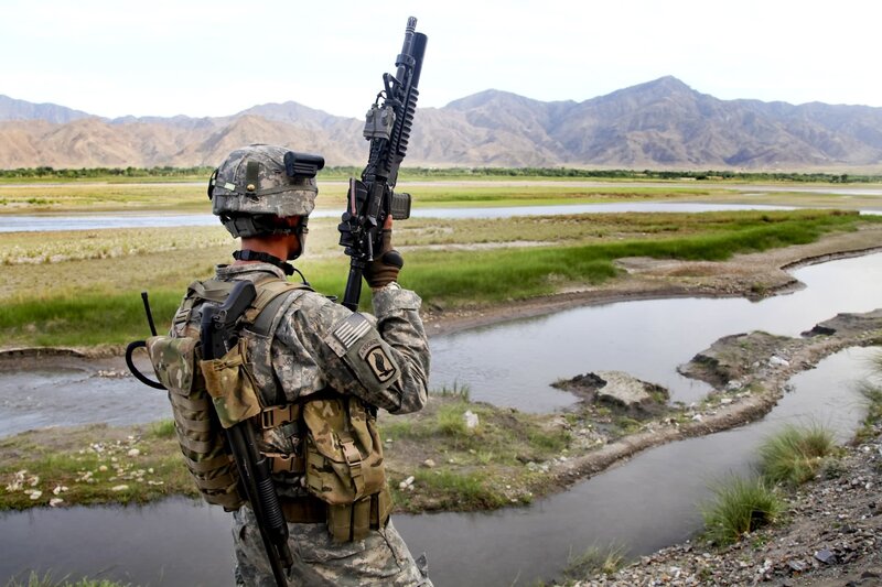 Soldier on patrol in mountainous region