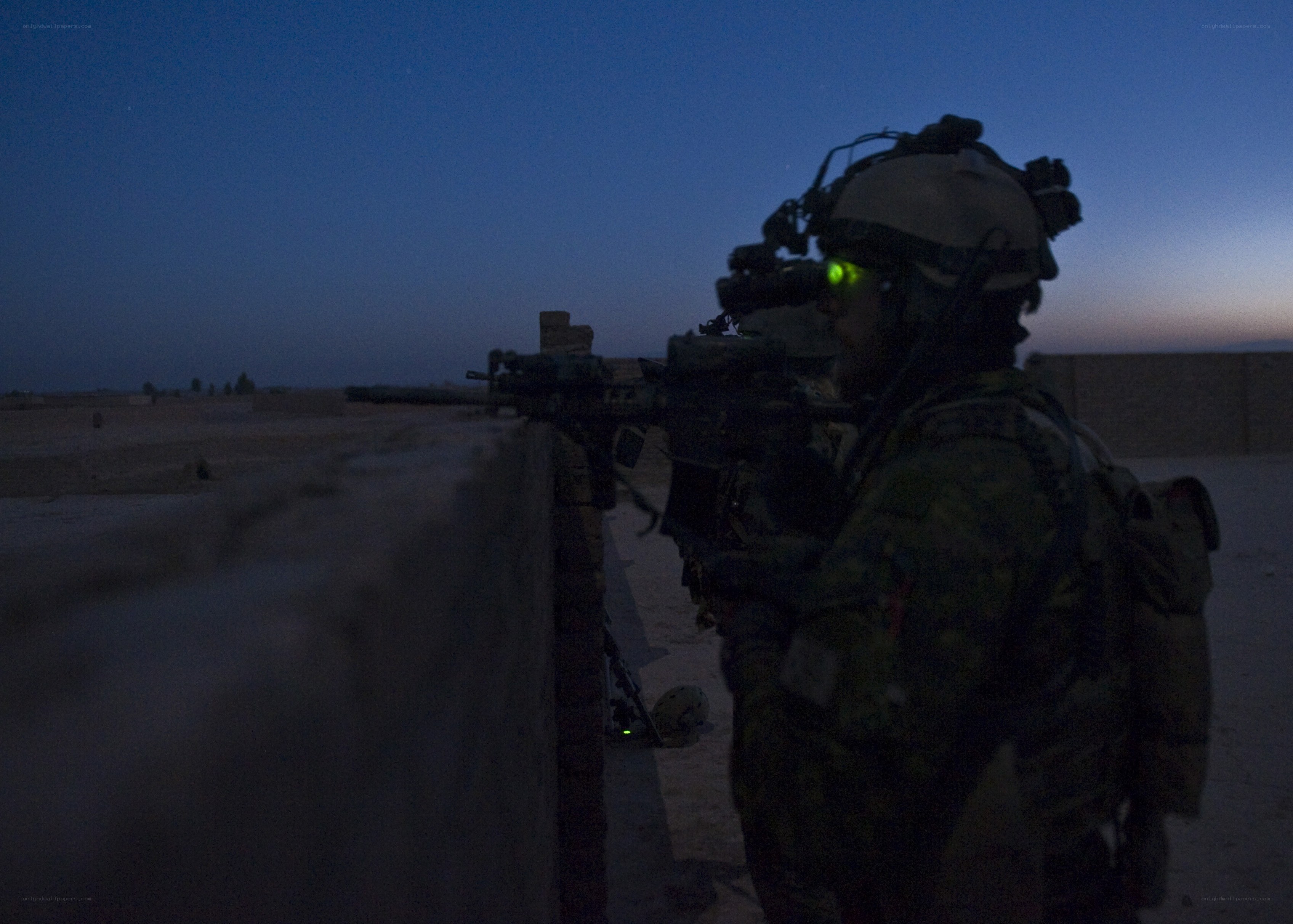 Soldier on watch at dusk