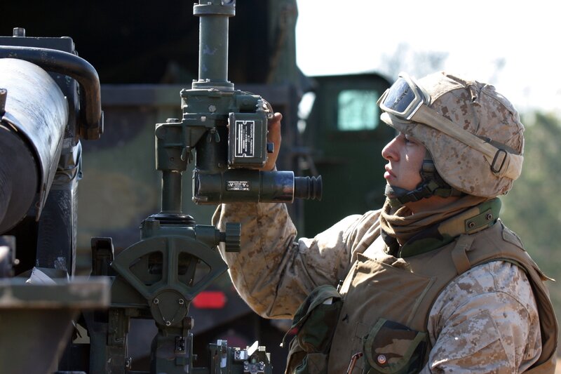 soldier operating artillery equipment