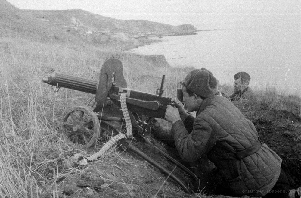Soldier operating machine gun