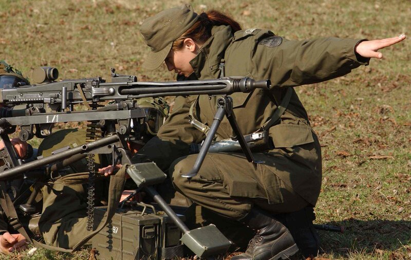 Soldier operating machine gun