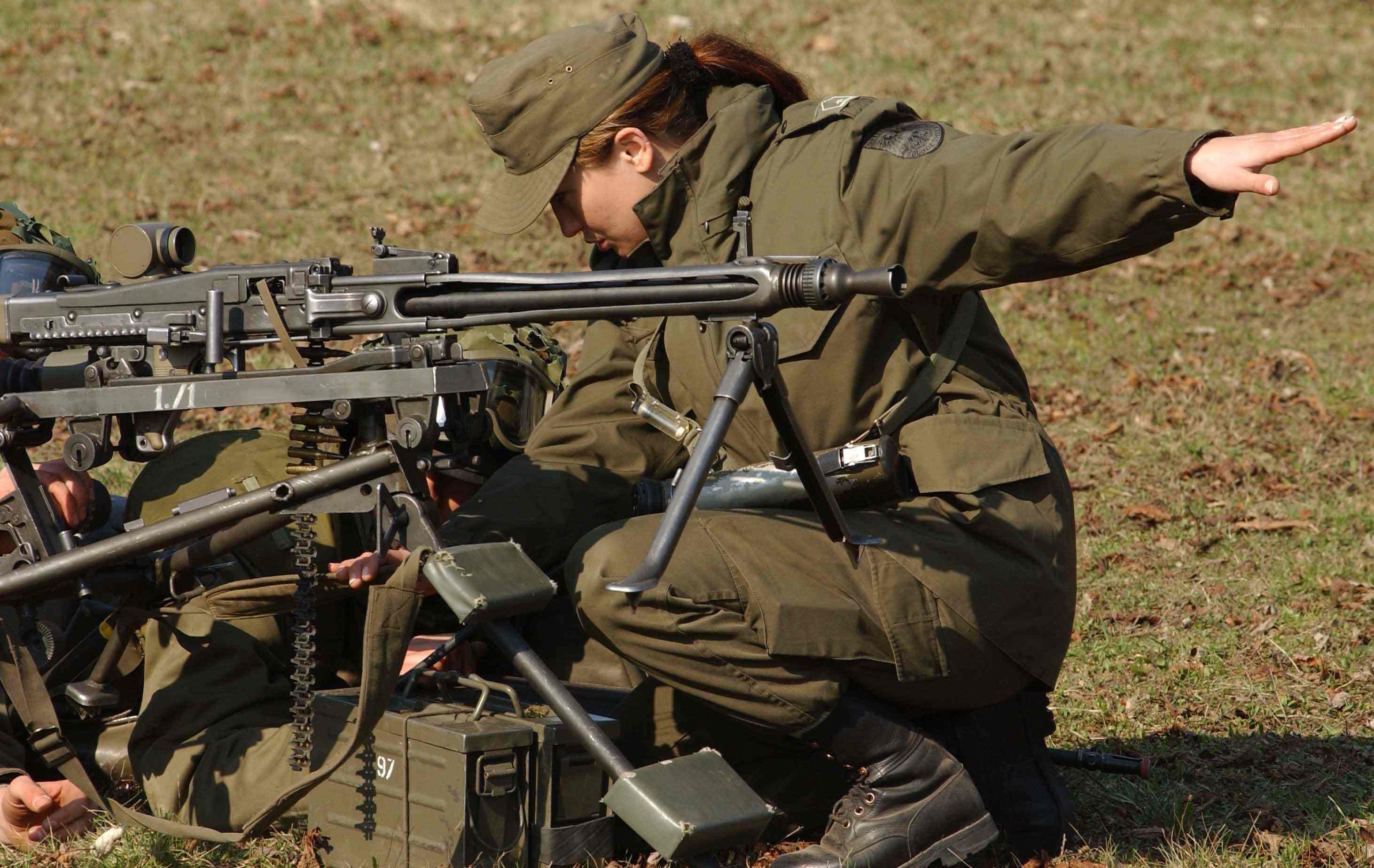Soldier operating machine gun