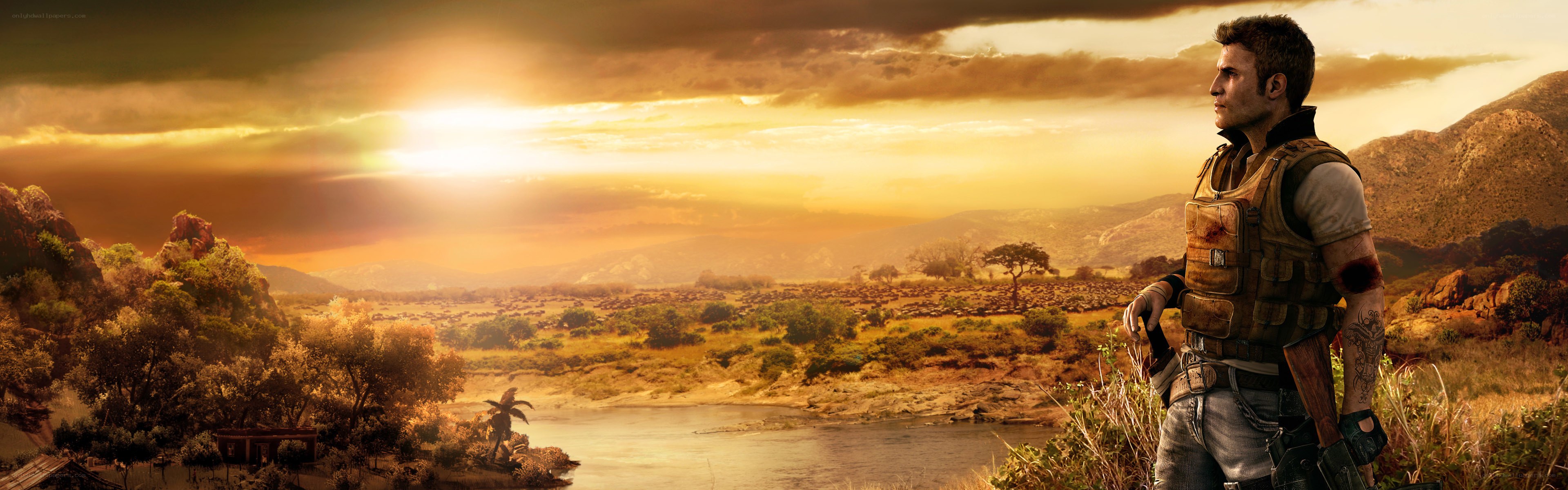 Soldier overlooking a river at sunset