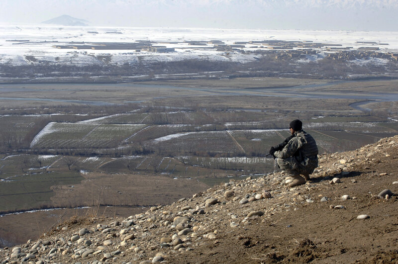 Soldier overlooking a valley