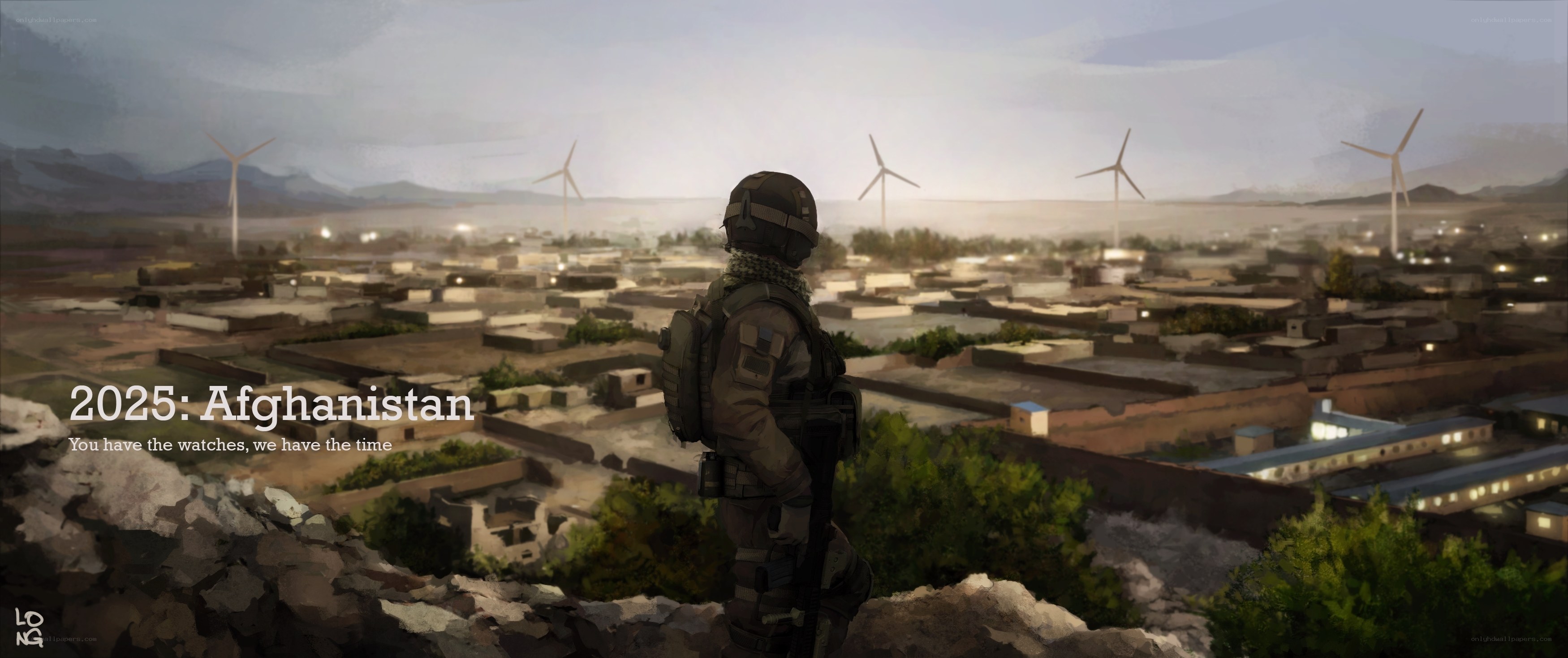 Soldier overlooking Afghan town