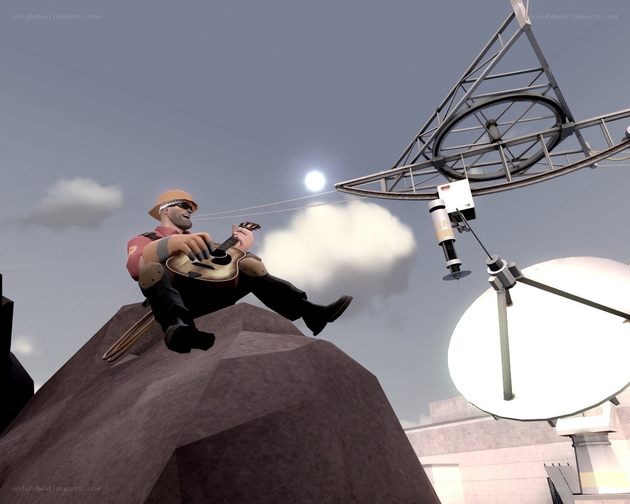 Soldier playing guitar on a rock