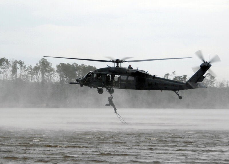 Soldier Rappelling from Helicopter — Gray, Dramatic