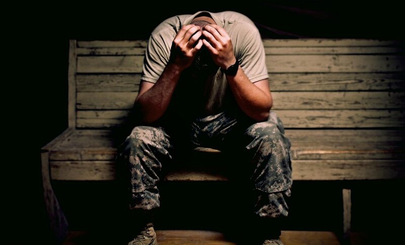 Soldier Sitting on Bench