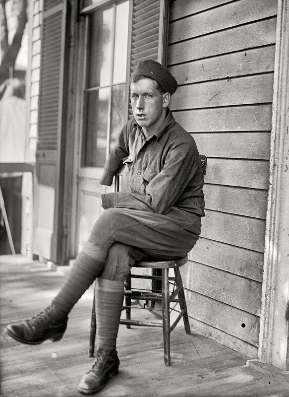 Soldier sitting on porch