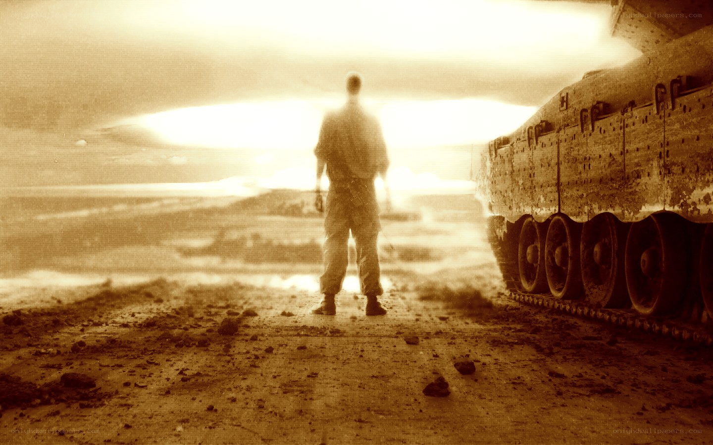 Soldier stands before tank