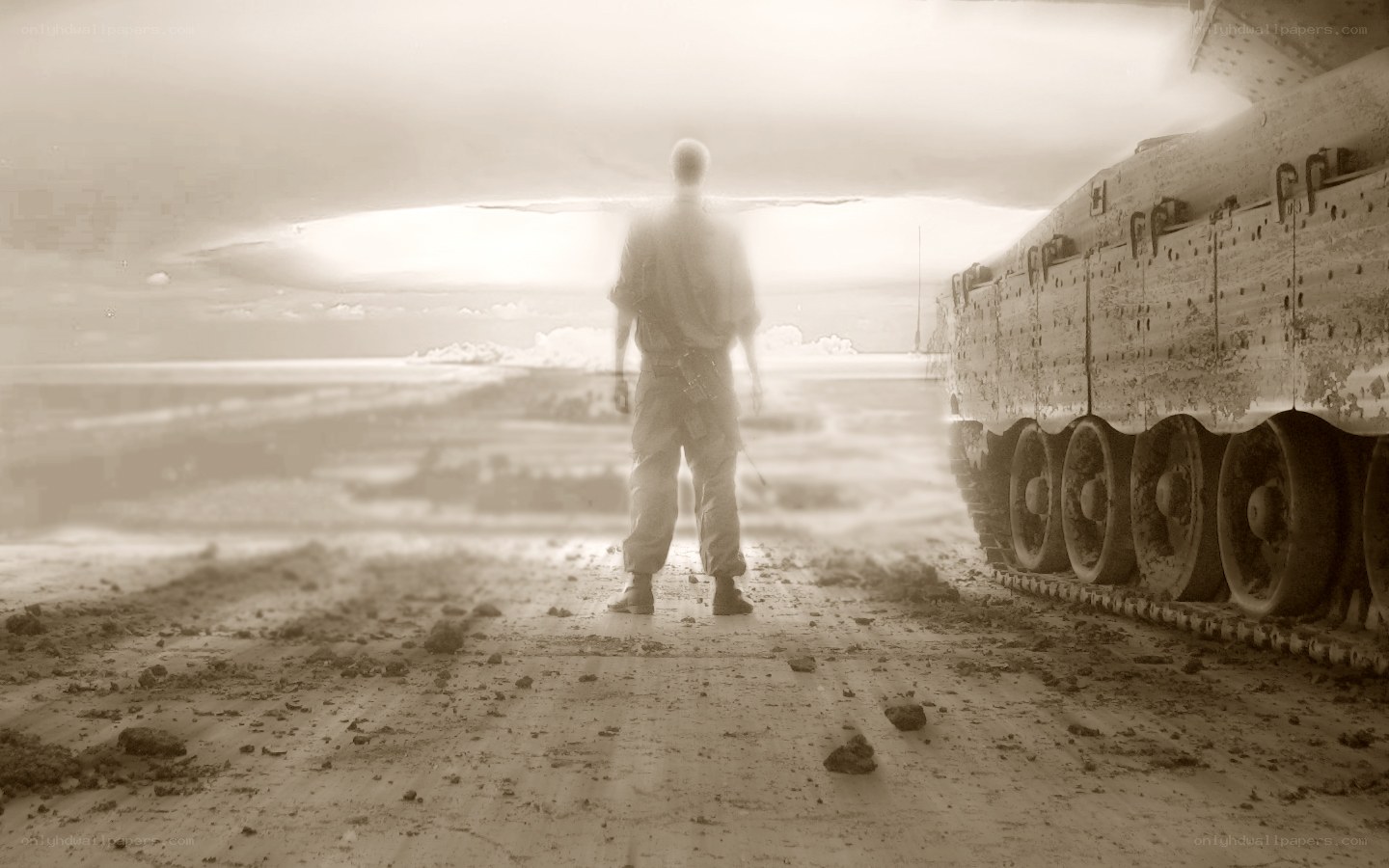 Soldier stands before tank