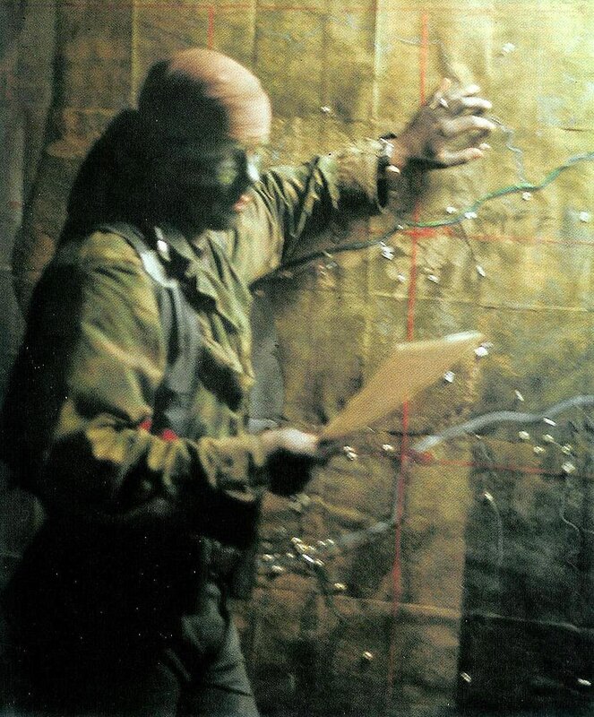 Soldier studying a map