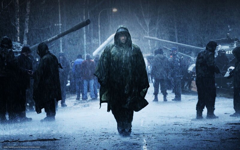 Soldier walking in rainstorm