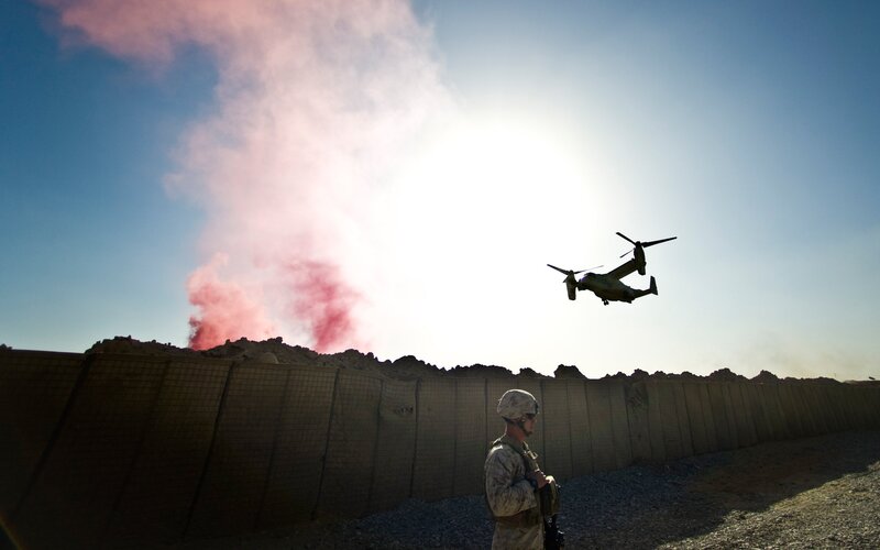Soldier Watching Helicopter — Blue