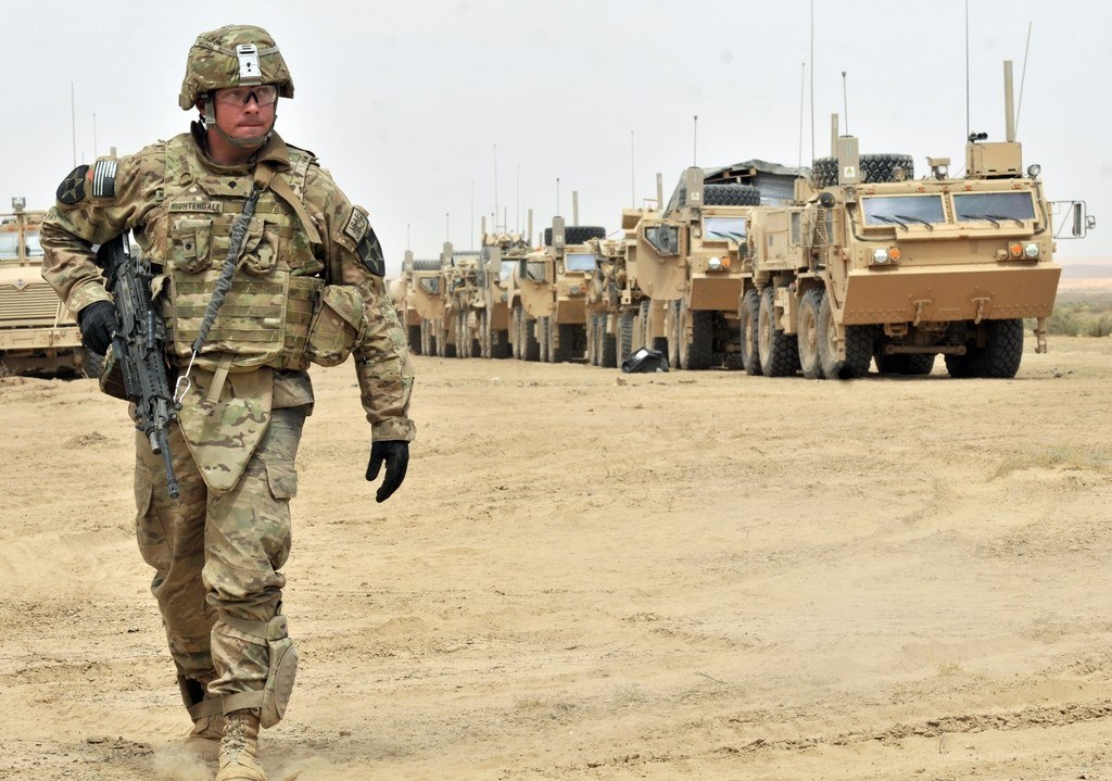 Soldier with armored vehicles